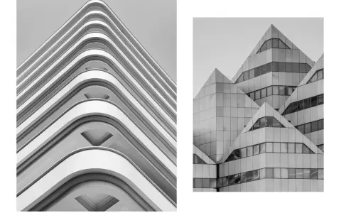 Dwie fasady budynków w czerni i bieli. Po lewej łagodne, faliste balkony, po prawej ostre, geometryczne kształty. Fascynująca fotografia architektury.