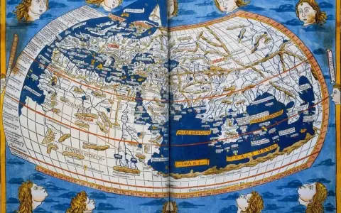 Carte de navigation ancienne montrant l'Europe, l'Afrique et l'Asie, avec des têtes de vent aux coins.