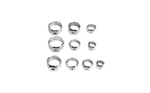 Ensemble de colliers à oreilles pour sertissage tuyau, de différentes tailles, en métal argenté, sur fond blanc.