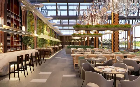 Elegante restaurante con barra de mármol, estanterías de vino, paredes verdes y exuberante vegetación, ideal para negocios de comida.