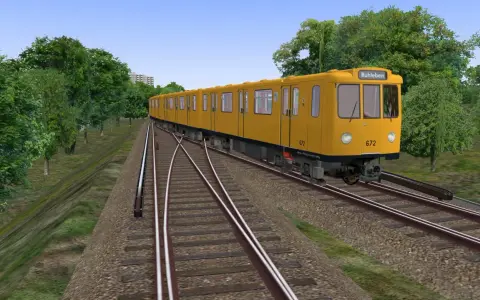 Żółty tramwaj jedzie po torach, otoczony zielenią. Sprawdź, czy Twój komputer spełnia omsi 2 wymagania, by cieszyć się taką grafiką.