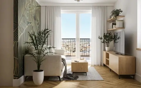 Przytulny, bardzo mały salon w bloku z designerską tapetą, jasną kanapą i widokiem na miasto.