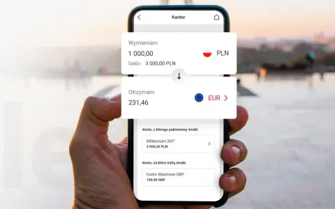 Dłoń trzyma smartfon z aplikacją kantoru. Widoczny kurs wymiany PLN na EUR.