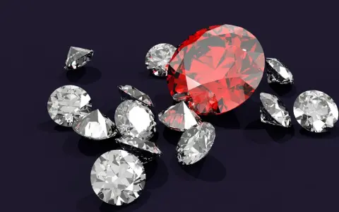 Wokół dużego, czerwonego rubinu, znanego z magicznych właściwości, rozsypane są błyszczące diamenty.