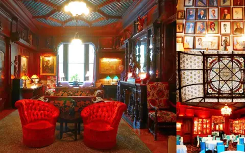 The National Arts Club features opulent interiors with red velvet chairs, ornate woodwork, and a stunning stained-glass ceiling.