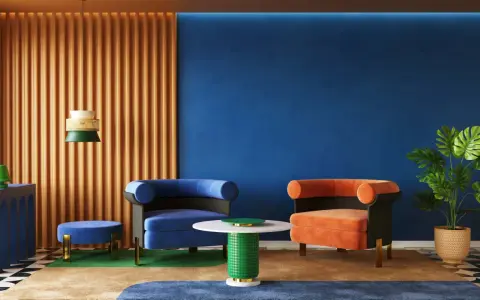 Nowoczesny salon z niebieską ścianą i pomarańczową zasłoną. Krzesła w kolorze niebieskim i pomarańczowym. Kolory ścian inspiracje.
