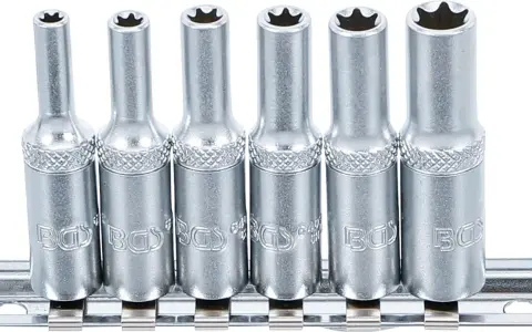 Juego de vasos con puntas de estrella, cada llave torx hembra lista para usar en su carril metálico.