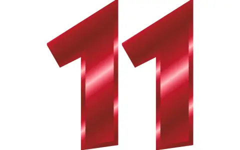 Czerwone, błyszczące cyfry 1 i 1 tworzą liczbę 11. W numerologii 11 jest liczbą mistrzowską, ale redukuje się do 2 (1+1). Może też symbolizować połączenie energii numerologicznej 3 i 11.