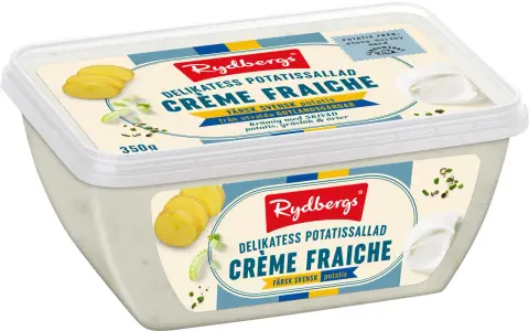 En krämig enkel potatissallad med crème fraiche, skivad potatis, gräslök och örter från Rydbergs. Perfekt till sommarmaten!