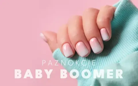 Delikatny manicure baby boomer na paznokciach, subtelny gradient różu i bieli.