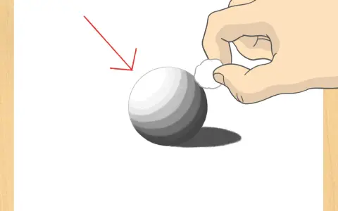 Ilustración de cómo dibujar una esfera con sombreado. Una mano difumina el sombreado con un algodón. Flecha roja indica la fuente de luz.