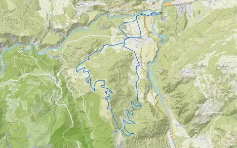 Mapa szlaku rowerowego w górach, pokazująca dolinę rzeki i strome zbocza. Gdzie są Alpy? Tutaj, wśród zielonych wzgórz i skalistych szczytów.