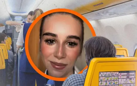 Uśmiechnięta stewardessa w kabinie Ryanair. Zastanawiasz się, ile zarabia stewardessa w Ryanair?