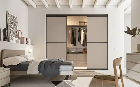 Camera da letto moderna con cabina armadio a vista, idee per organizzare lo spazio con stile.