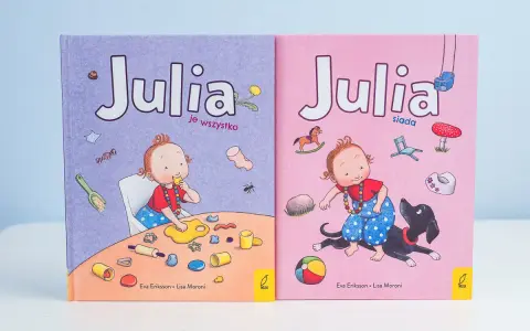 Skandynawskie książki dla dzieci "Julia je wszystko" i "Julia siada" z uroczymi ilustracjami.