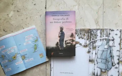 Mappa delle Canarie, libro "Geografia di un dolore perfetto" e illustrazione di uno zaino in un bosco innevato.