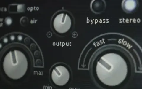 Panel urządzenia audio z pokrętłami i przełącznikami, w tym "output" i "fast/slow", sugeruje kontrolę nad dynamiką, jak w przypadku **noise gate**.