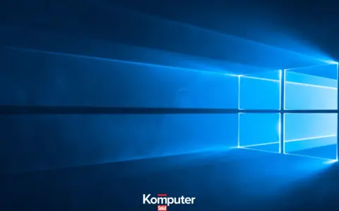 Niebieskie tło z logo Windows. Dowiedz się, jak wyłączyć laptopa, aby bezpiecznie zakończyć pracę.