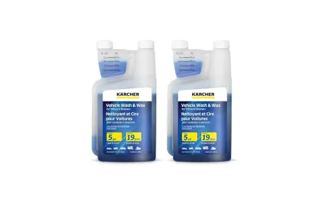 Two bottles of Kärcher Vehicle Wash & Wax for pressure washers. This car wash soap is designed for pressure washers, ensuring a clean and shiny finish.