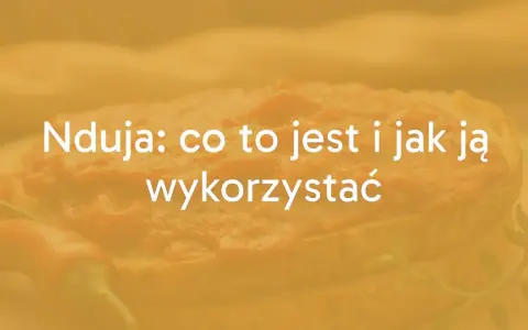 Nduja: co to jest i jak ją wykorzystać. Pikantna pasta na chlebie, z papryczką chili w tle.