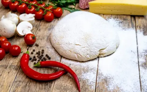 Jaka mąka do pizzy? Sekrety typu 00, W i idealnego ciasta