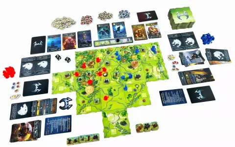 Plansza do gry **Northgard: Niezbadane Ziemie** z kartami, żetonami i figurkami.