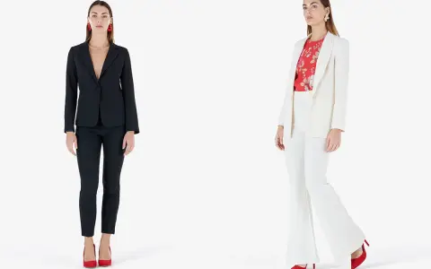 Donna con giacca aperta o chiusa: un completo nero elegante e un tailleur bianco con camicetta a fiori.