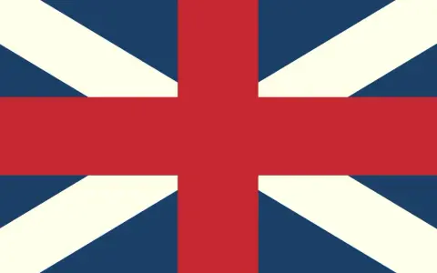 Flaga Wielkiej Brytanii, znana jako Union Jack, z czerwonym krzyżem na niebieskim tle i białymi oraz czerwonymi pasami.