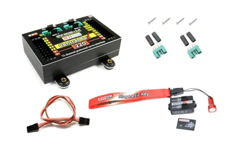 Jeti Central Box 220 mit Zubehör: Servoschnittstelle, Magnetic Key, Kabel und Schrauben.