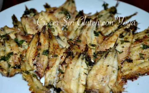 Deliciosos boquerones al horno, crujientes y dorados, con hierbas frescas y un toque de sal. ¡Una receta fácil y sabrosa!