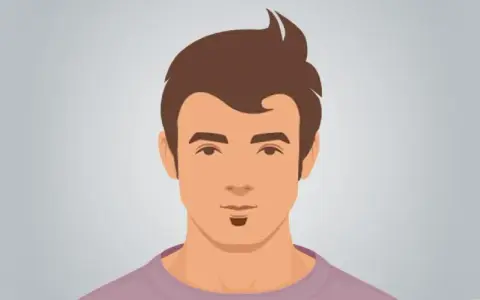 Un hombre con un peinado moderno y una barba mosca.