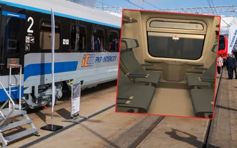 Nowy wagon PKP Intercity z wygodnymi siedzeniami i dużym oknem.
