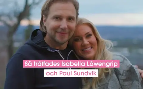 Isabella Löwengrip och Paul Sundvik ler mot kameran, tätt omslingrade utomhus.