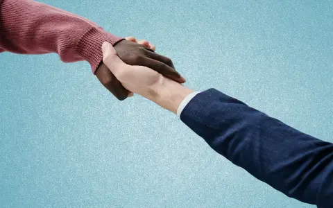 Uścisk dłoni symbolizujący zakończenie współpracy, np. wypowiedzenie umowy najmu na czas określony.