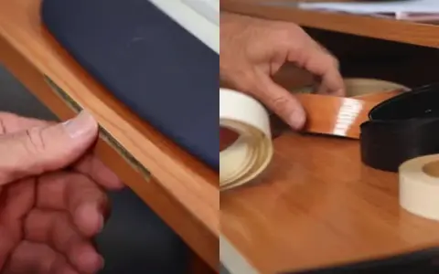 Manos reparando melamina despegada con cinta adhesiva de borde.