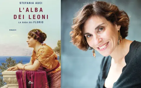 Stefania Auci, autrice del nuovo libro "L'Alba dei Leoni", sorride in primo piano accanto alla copertina del suo romanzo.