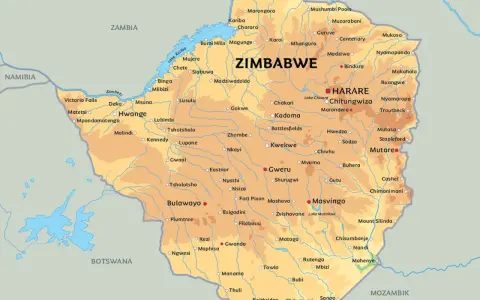 Mapa Zimbabwe z zaznaczonymi miastami, rzekami i jeziorami. Język polski.
