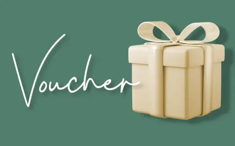 Elegancki prezent z napisem "Voucher" i wstążką. Idealny na relaks w Termach Chochołowskich.