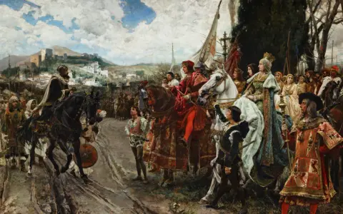 Prachtvolle Szene mit Arabern in Spanien im Mittelalter. Reiter und Fußgänger in farbenprächtiger Kleidung ziehen durch eine Stadt mit Festung.