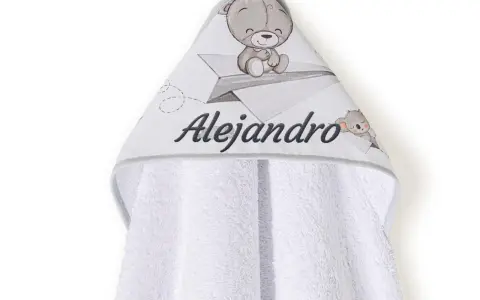 Capa de baño para bebé con osito y avión de papel. Las medidas de esta capa de baño para bebé son ideales para envolver a tu pequeño.