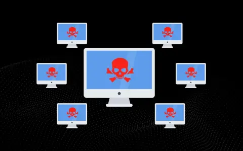 Komputery z czerwonymi czaszkami na ekranach, symbolizujące atak DDoS.
