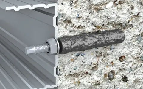 Przekrój pokazuje, jak kotwy chemiczne mocują profil aluminiowy do betonu. Solidne wiązanie zapewnia trwałość konstrukcji.