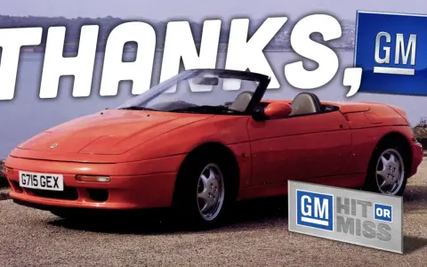 Red Lotus Elan M100 convertible sports car with "THANKS, GM" text and GM logos.