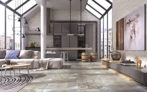 Nowoczesny salon z industrialnymi akcentami. Na podłodze piękne, wzorzyste płytki, które dodają charakteru.
