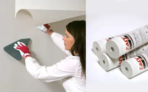 Kvinna med handskar sätter upp renoveringstapet på strukturtapet. Rullar med tapet syns också.
