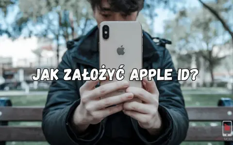 Mężczyzna trzyma iPhone'a z napisem "Jak założyć Apple ID?".