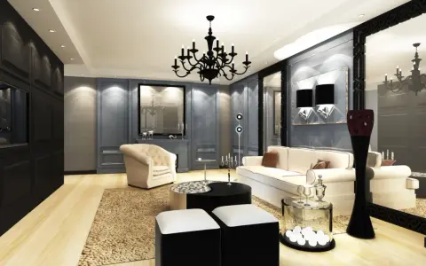 Elegancki salon w gotyckim stylu, z czarnym żyrandolem, kremową sofą i fotelem, ozdobiony lustrami i geometrycznymi akcentami.