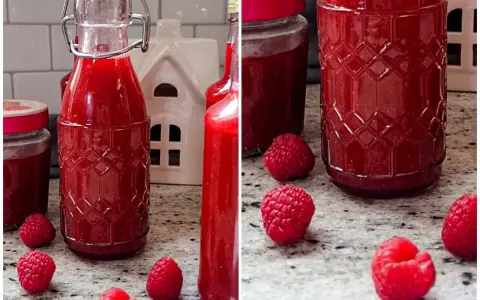 Himbeer Schnaps selber machen: Flaschen gefüllt mit rotem Likör, frische Himbeeren und ein kleines weißes Haus.