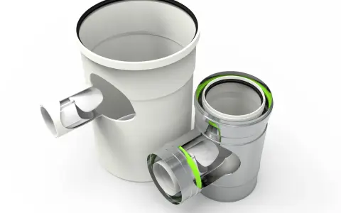 Componentes de chimenea para caldera de condensación, mostrando un tubo de PVC blanco y uno metálico con juntas verdes.