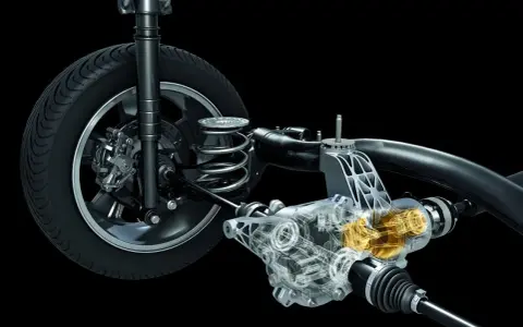 Przekładnia z widocznym mechanizmem napędu 4x4 dołączany automatycznie. Widoczna sprężyna, amortyzator i półosie.